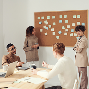 People gather in a room talking about something