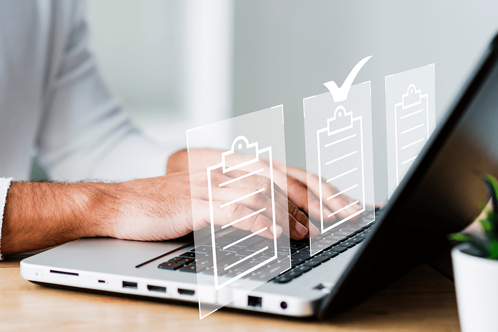 A laptop showing case management in dynamics 365 customer service hub